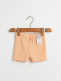 Pep & Co baby shorts, peach infant bottoms, 6-9 months baby girl clothes, ribbed baby shorts, lettuce edge trim shorts, summer baby essentials, new with tags baby clothes, Tiny Thrift Store fashion.