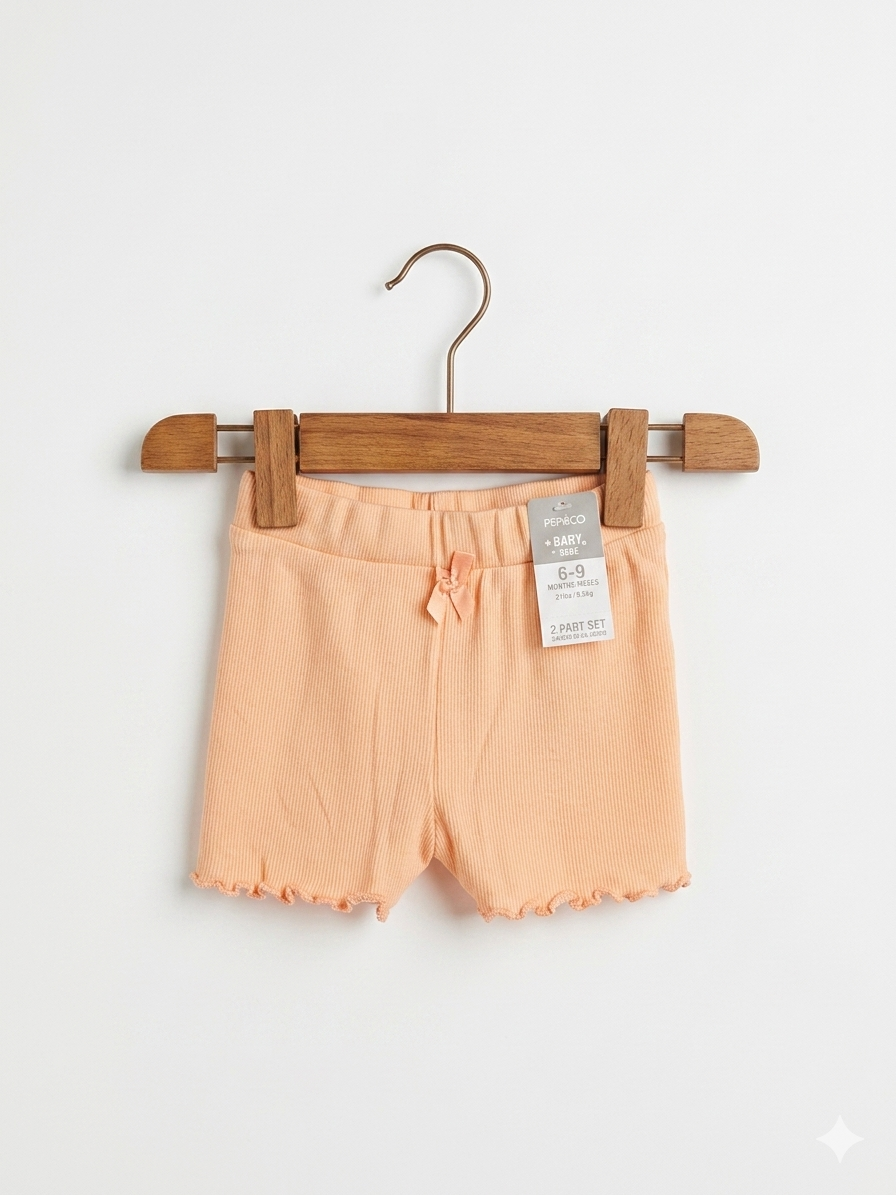 Pep & Co baby shorts, peach infant bottoms, 6-9 months baby girl clothes, ribbed baby shorts, lettuce edge trim shorts, summer baby essentials, new with tags baby clothes, Tiny Thrift Store fashion.