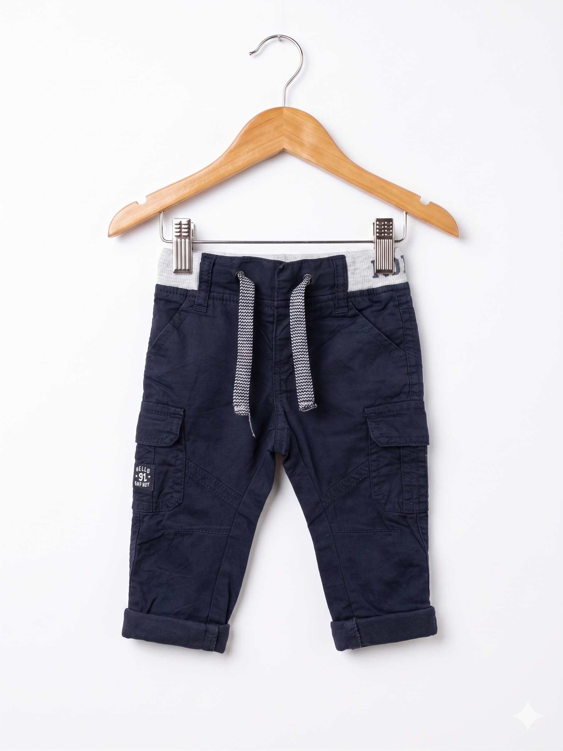 Front view of Baby by Gémo navy blue cargo joggers with grey waistband for 3 months.