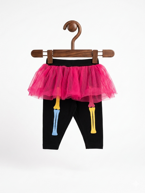 Baby girls black leggings featuring a colorful blue and yellow skeleton bone print on the legs and an attached bright hot pink tiered tulle tutu skirt, size 0-3 months.