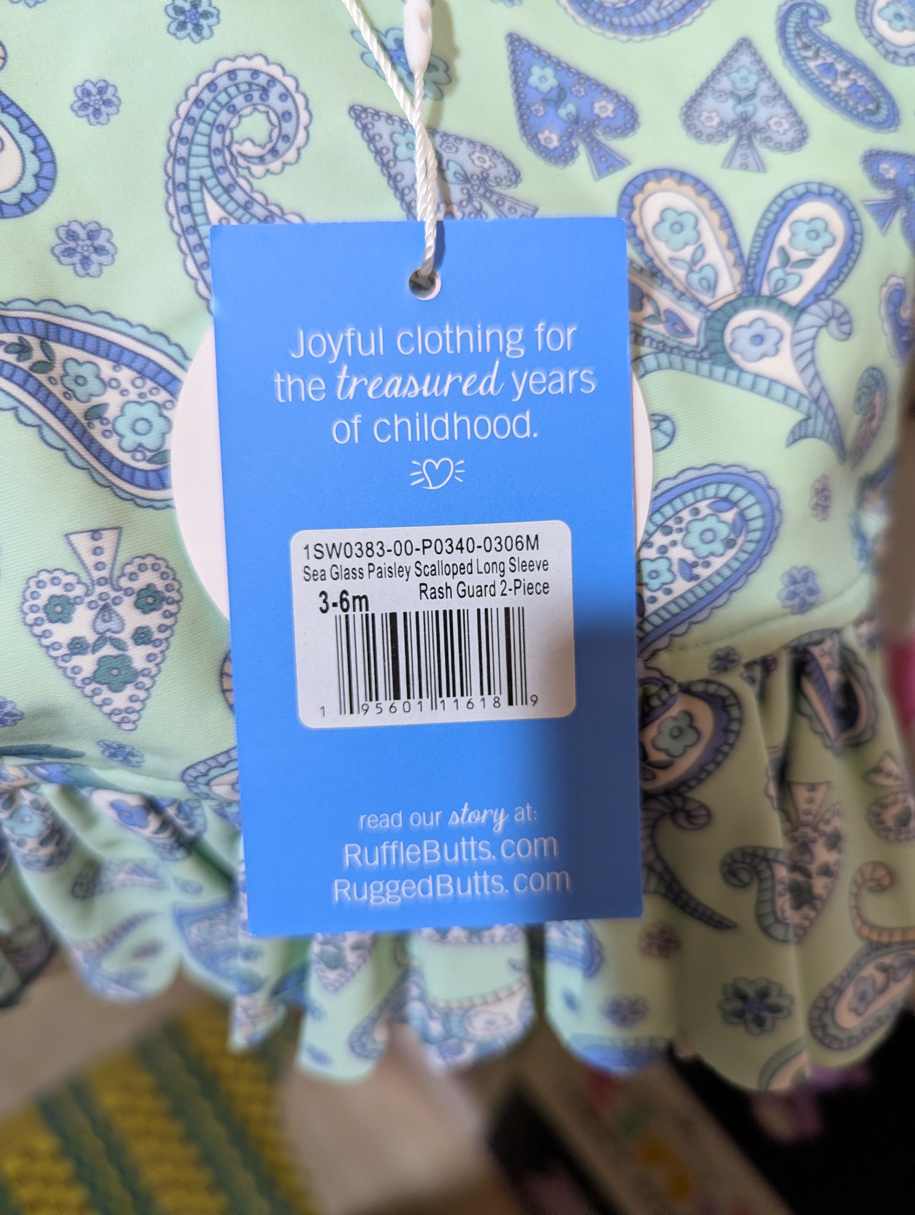 RuffleButts Baby Girls Sea Glass "Sea Glass Paisley" Long Sleeve Rash Guard - Size Estimated Age 3-6 Months AB2