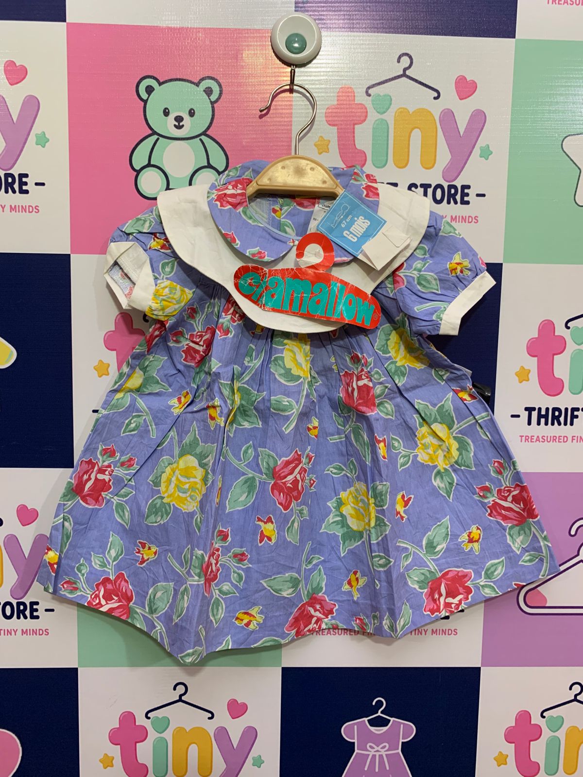 Front view of a lavender Chamallow Paris floral dress for baby girls featuring a large white collar and red rose prints, brand new with vintage tags at Tiny Thrift Store